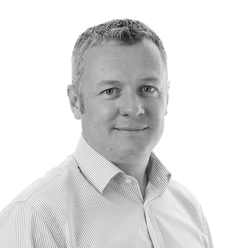 A black & white image of a staff member (Pete Bowers)