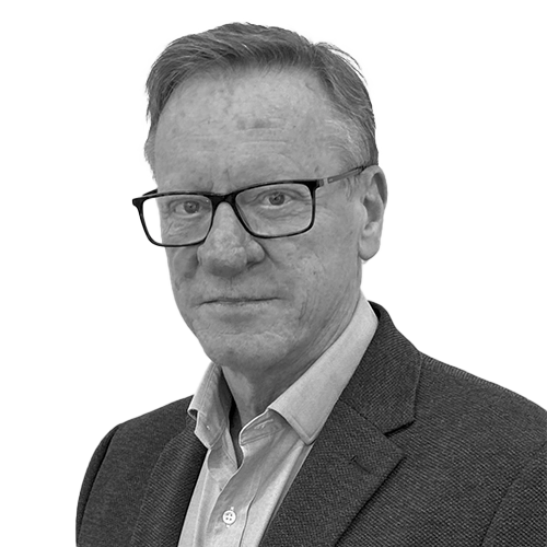 A black & white image of a staff member (Wayne Churchill)