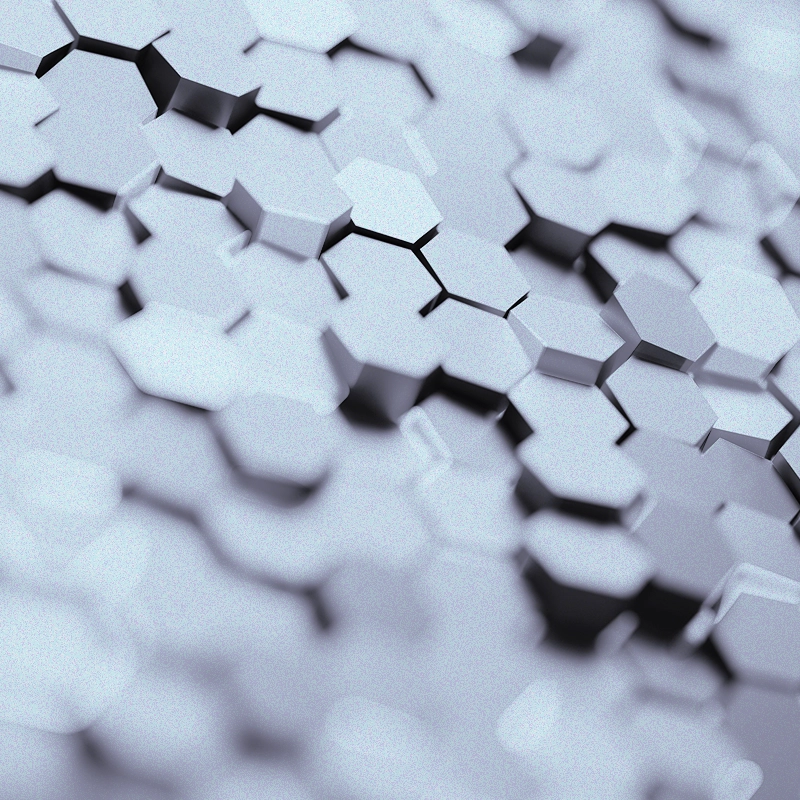 A grey hexagonal pattern breaking away from itself.