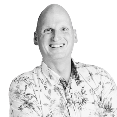 A black & white image of a staff member (Paul Cragg)