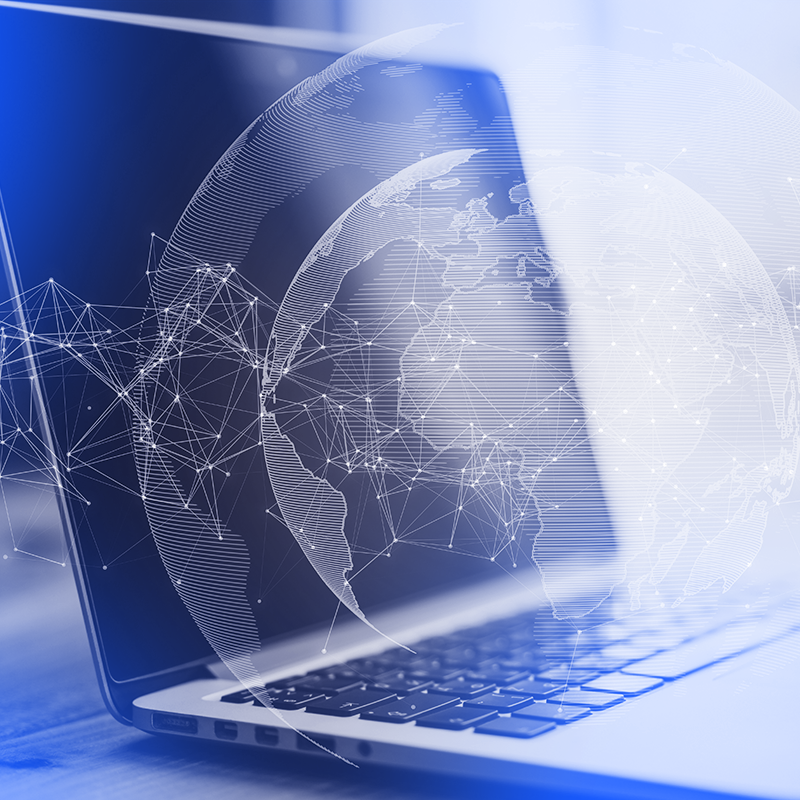 laptop and a digital globe